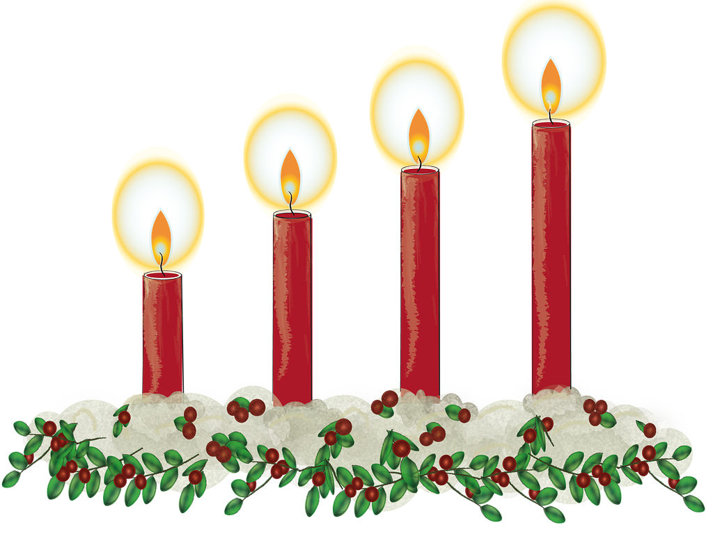 Ein Adventsgesteck, auf dem alle vier Kerzen brennen